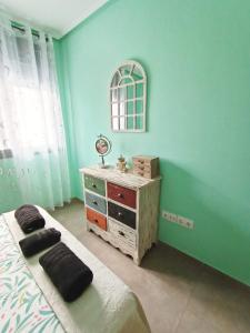 Postel nebo postele na pokoji v ubytování Apartamento El Zapillo