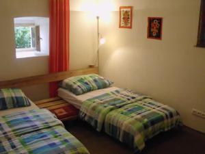 Rúm í herbergi á Bohemia Retreat
