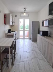 Η κουζίνα ή μικρή κουζίνα στο Civico 14 Apartment 4B +14 φωτογραφίες