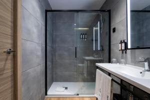 Kúpeľňa v ubytovaní Petit Palace Cliper-Gran Vía