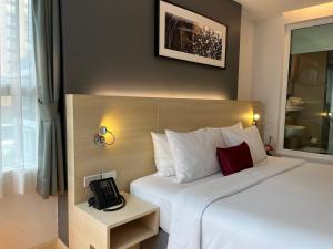 Katil atau katil-katil dalam bilik di Arize Hotel Sukhumvit