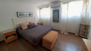 Łóżko lub łóżka w pokoju w obiekcie Coqueto piso con Billar en Benalmadena Costa