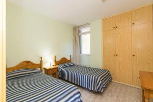 Postel nebo postele na pokoji v ubytování Hotel LIVVO Veril Playa