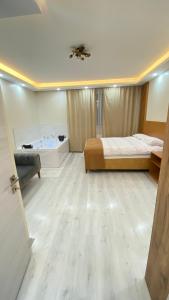 Krevet ili kreveti u jedinici u objektu Nebula Residence- Luxury Beyoğlu Jakuzili