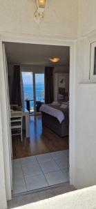 Postel nebo postele na pokoji v ubytování Apartmani Luan