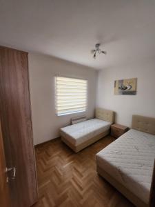 Llit o llits en una habitació de Villa Sarajevo 5