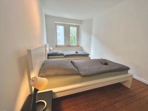 เตียงในห้องที่ 5 Betten Wohnung Vahrenwald-List