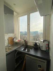 Appartement ensoleille, central et tout equipe avec vue Tour Eiffel et Pantheon