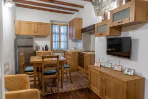 Kuchyň nebo kuchyňský kout v ubytování La Prua