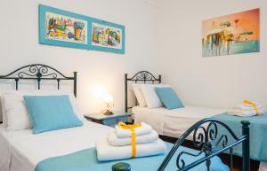A bed or beds in a room at Villa Luritu Luxury Pool Tricase by HDSalento