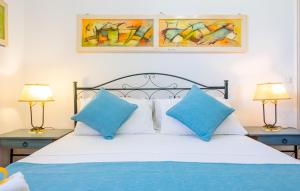 A bed or beds in a room at Villa Luritu Luxury Pool Tricase by HDSalento