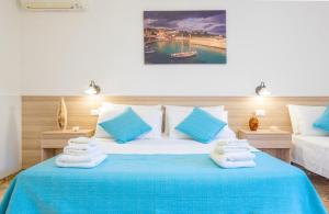 A bed or beds in a room at Villa Luritu Luxury Pool Tricase by HDSalento
