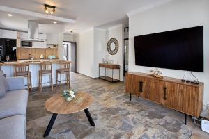TV a/nebo společenská místnost v ubytování CASA 7 SOLES