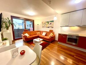 a living room with a couch and a table at Entire Apartment, near Clarion, O2 Arena, Metro 3 min, Easter market in City Center 15 min in Prague