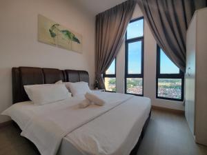 Postel nebo postele na pokoji v ubytování The Grand SS15 Sunway 4Pax 2BRs City View - Free WiFi, Infinity Pool & Gym