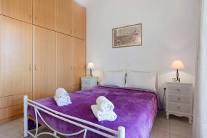 Posteľ alebo postele v izbe v ubytovaní Yiannis Superior Apartment 8