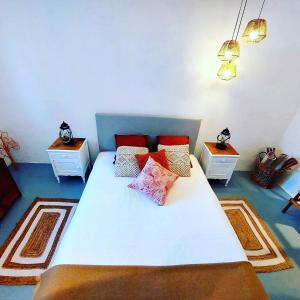 Ένα ή περισσότερα κρεβάτια σε δωμάτιο στο Moradia com Piscina Casa Mourisca Alqueva