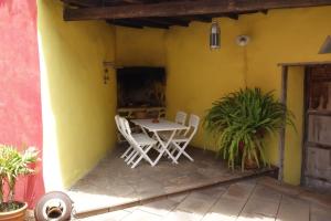 Televízia a/alebo spoločenská miestnosť v ubytovaní Finca Las Canitas - Ferienhaus Teneriffa