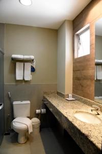 A bathroom at Golden Blue Hotel