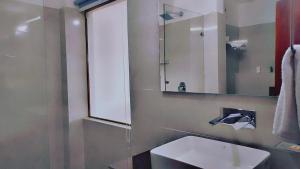 Ein Badezimmer in der Unterkunft Lha-Zes