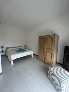 A bed or beds in a room at villetta Monte