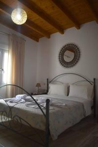 Ένα ή περισσότερα κρεβάτια σε δωμάτιο στο Garden House - Kastri Crete