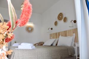 Кровать или кровати в номере Afroditi Junior Suites