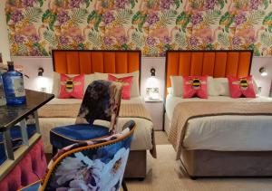 Voodi või voodid majutusasutuse Allingham Arms Hotel toas