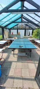 Stolní tenis v ubytování B&B Guesthouse Claeswael nebo okolí
