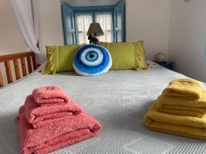 Postel nebo postele na pokoji v ubytování Patmos Horizon @Sapsila Beach