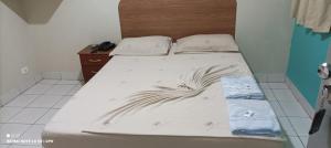 Кровать или кровати в номере New Comercial Palace Hotel