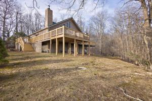 a large house sitting on top of a field at Altitude Adjustment in Blowing Rock