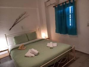 Postel nebo postele na pokoji v ubytování Asteri Sea View Apartment, Seafront