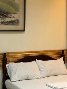 Postel nebo postele na pokoji v ubytování Inside Room Inn
