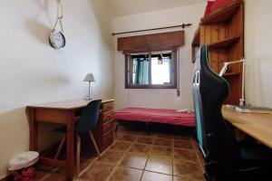 Łóżko lub łóżka w pokoju w obiekcie Casa Manus