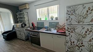 Kuchnia lub aneks kuchenny w obiekcie Coqueto piso con Billar en Benalmadena Costa