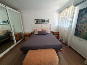 Łóżko lub łóżka w pokoju w obiekcie Coqueto piso con Billar en Benalmadena Costa