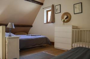Posteľ alebo postele v izbe v ubytovaní Chambre d'hôte de charme dans maison indépendante