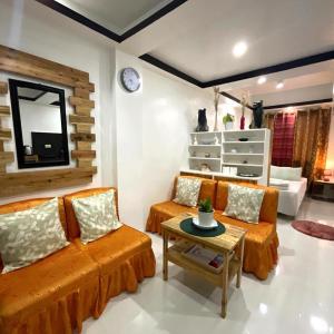 Ruang duduk di Antipolo Staycation & Transient Affordable Condo Unit By Myra