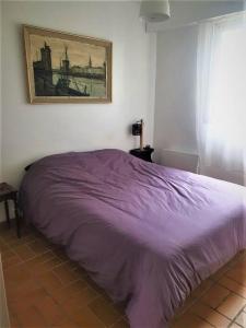 Katil atau katil-katil dalam bilik di Appartement vue mer, 2 chambres