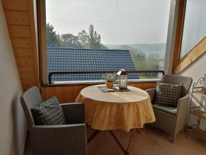 Balkón nebo terasa v ubytování Eifelferienwohnungen "Familie Saxler"