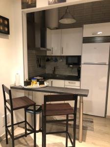 Kuchyň nebo kuchyňský kout v ubytování Apartamento Toledo San Justo