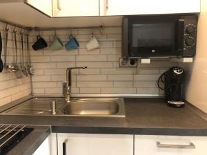 Kuchyň nebo kuchyňský kout v ubytování Apartamento Toledo San Justo