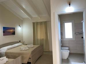 Koupelna v ubytování Is Arenas Biancas Agriturismo