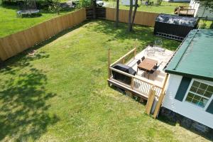 an aerial view of a yard next to a house at Black Ridgetop at NRG National Park in Lansing