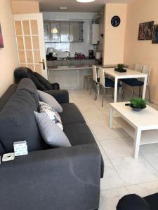 Posezení v ubytování APARTAMENTO A 50 METROS DE LA PLAYA DE SILGAR