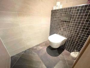 Et badeværelse på Garden Park Studio