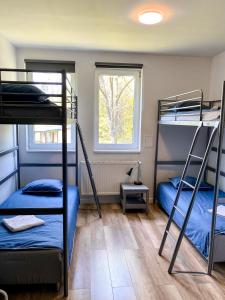 Postel nebo postele na pokoji v ubytování Ośrodek Wypoczynkowy Maria w Lewinie Kłodzkim - MARIA III