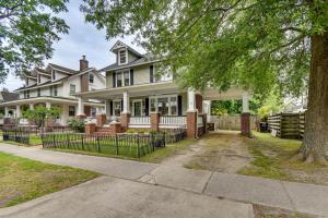 a large white house with a tree at Elizabeth City Vacation Rental Gazebo with Hot Tub! in Elizabeth City