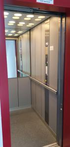a row of elevator stalls in an office building at Ferienwohnung zentrale Lage in Idar-Oberstein